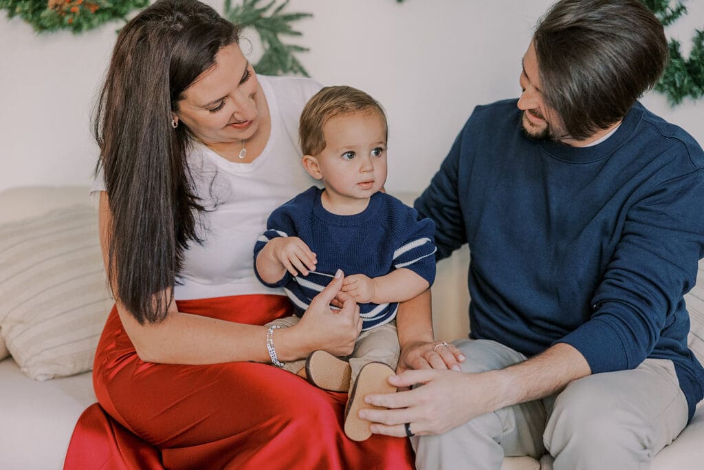 Richmond Christmas mini sessions featuring the Barnes family with their baby Lincoln in our festively decorated studio.