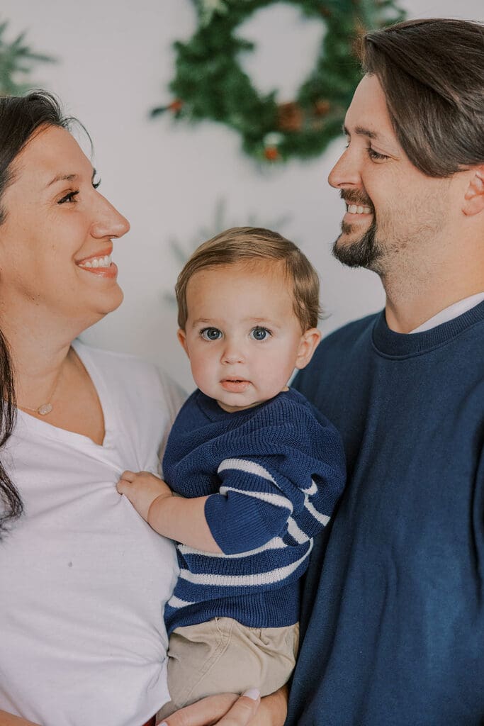 Richmond Christmas mini sessions featuring the Barnes family with their baby Lincoln in our festively decorated studio.