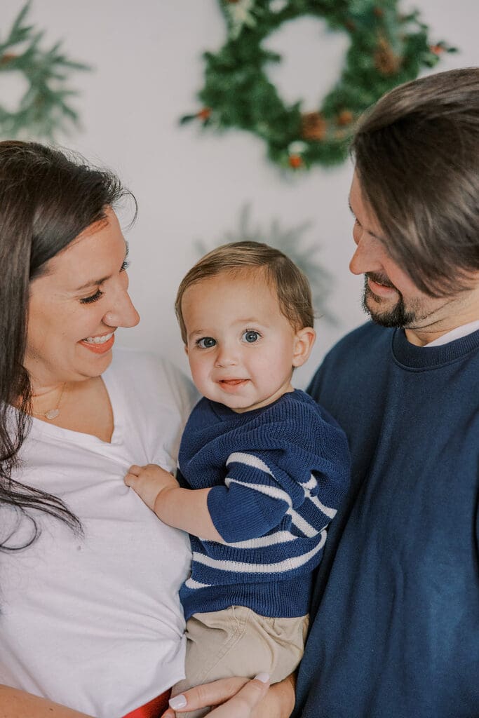 Richmond Christmas mini sessions featuring the Barnes family with their baby Lincoln in our festively decorated studio.