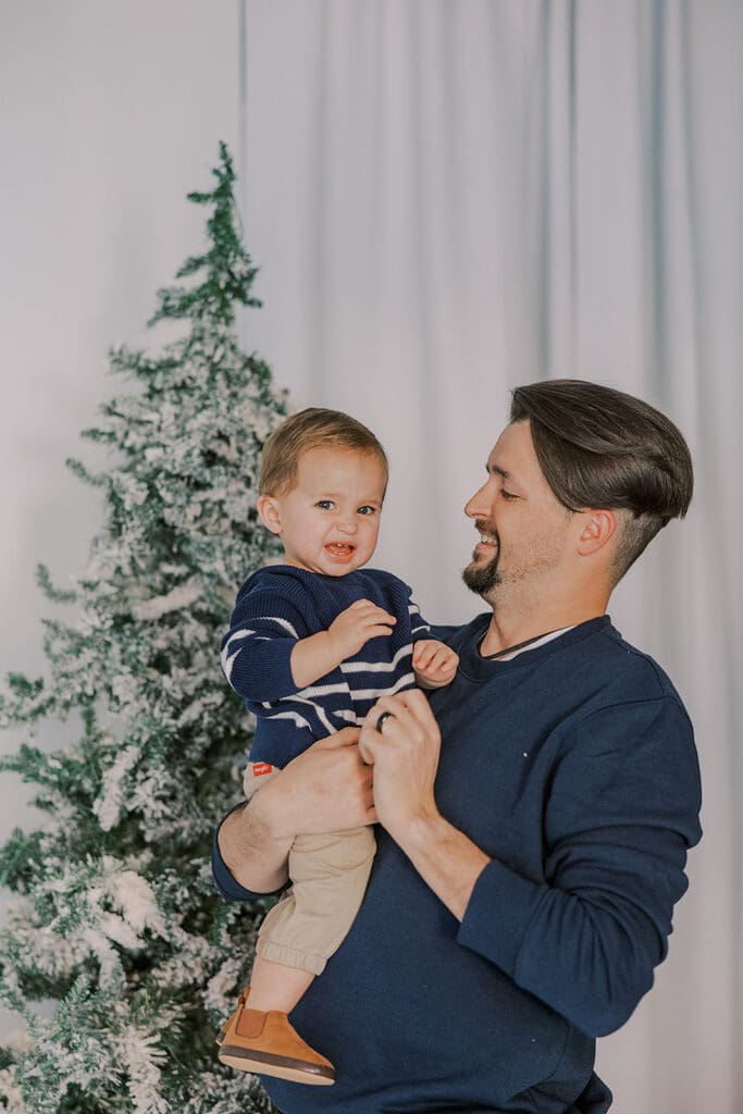 Richmond Christmas mini sessions featuring the Barnes family with their baby Lincoln in our festively decorated studio.