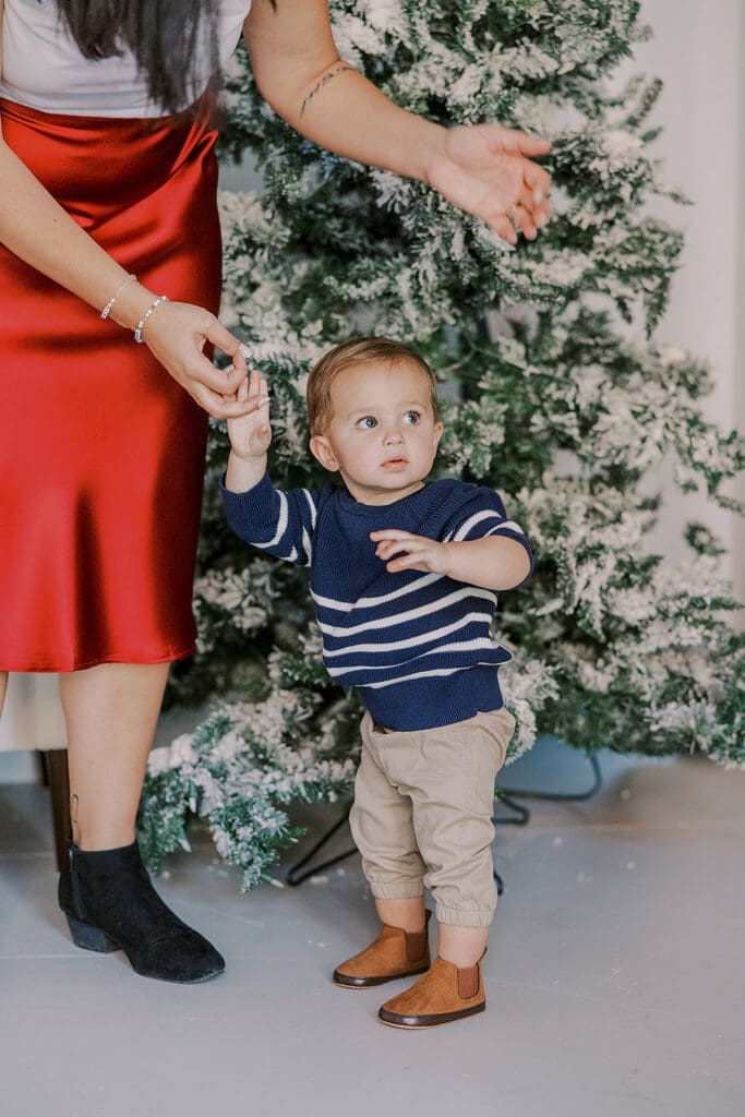 Richmond Christmas mini sessions featuring the Barnes family with their baby Lincoln in our festively decorated studio.