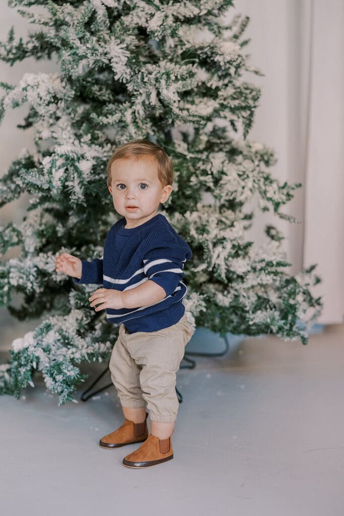 Richmond Christmas mini sessions featuring the Barnes family with their baby Lincoln in our festively decorated studio.