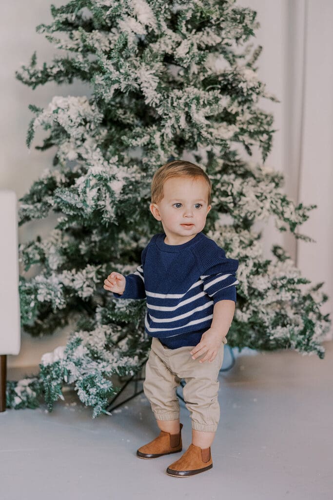 Richmond Christmas mini sessions featuring the Barnes family with their baby Lincoln in our festively decorated studio.