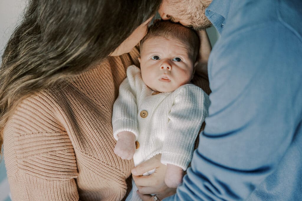 Richmond in-home newborn photographer session showing Baby Oliver with family, nursery details, and their dog.