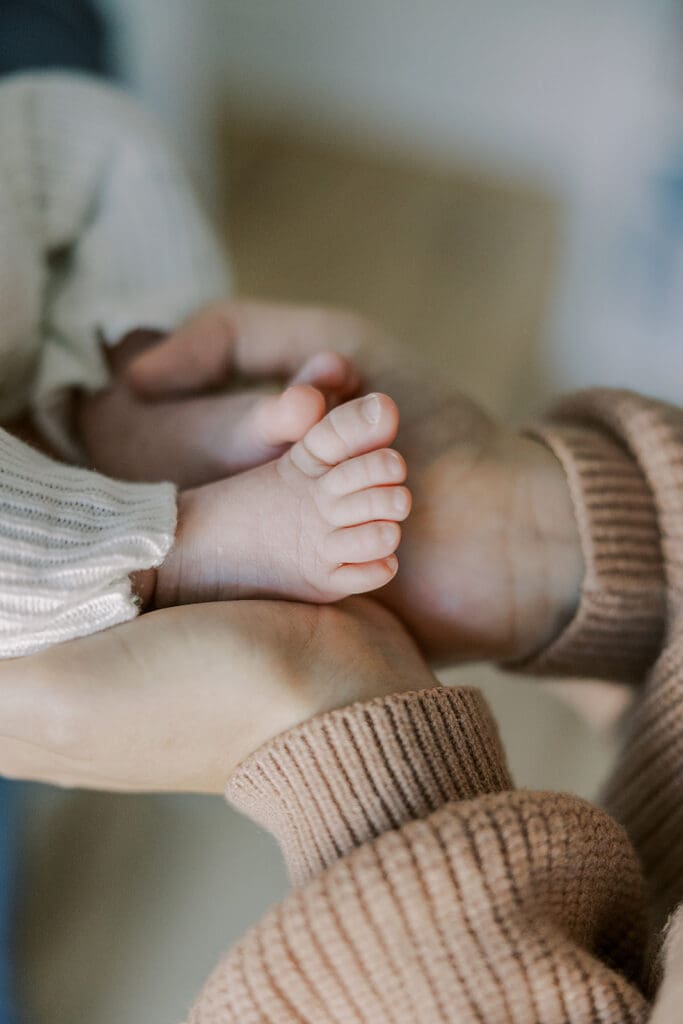 Richmond in-home newborn photographer session showing Baby Oliver with family, nursery details, and their dog.