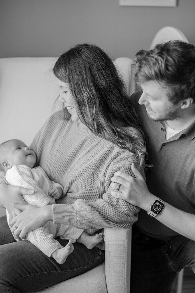 Richmond in-home newborn photographer session showing Baby Oliver with family, nursery details, and their dog.