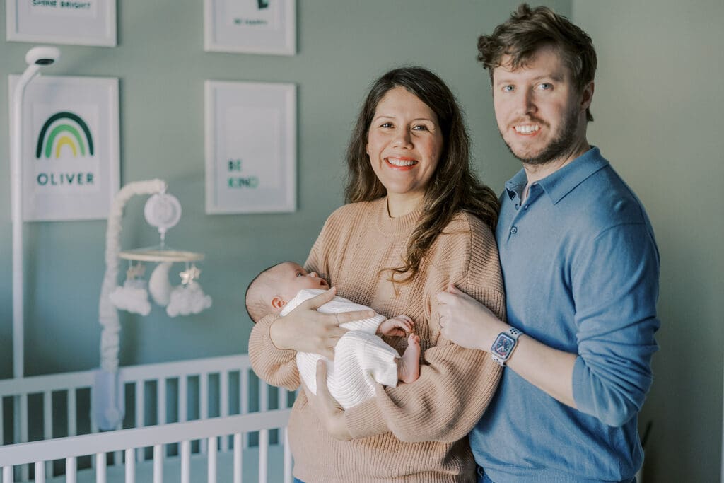 Richmond in-home newborn photographer session showing Baby Oliver with family, nursery details, and their dog.