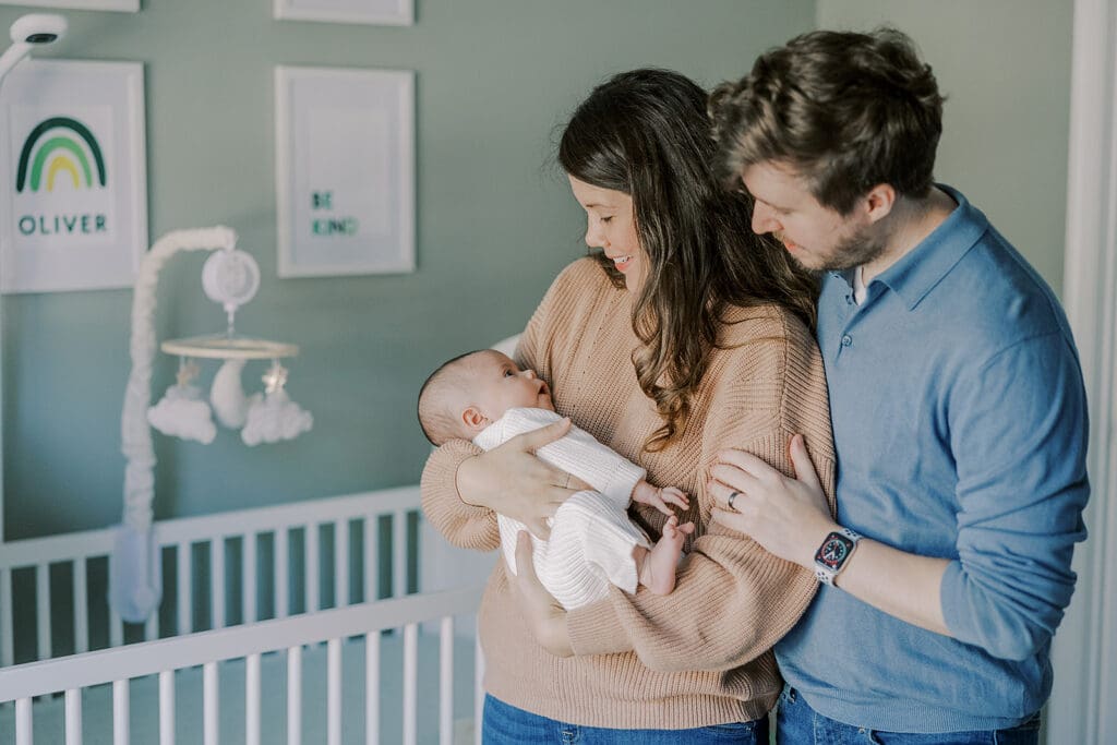 Richmond in-home newborn photographer session showing Baby Oliver with family, nursery details, and their dog.