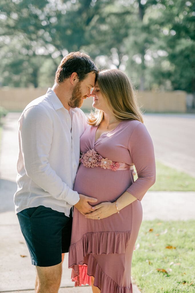 Downtown Richmond maternity photography session featuring the Huff family in their charming neighborhood.