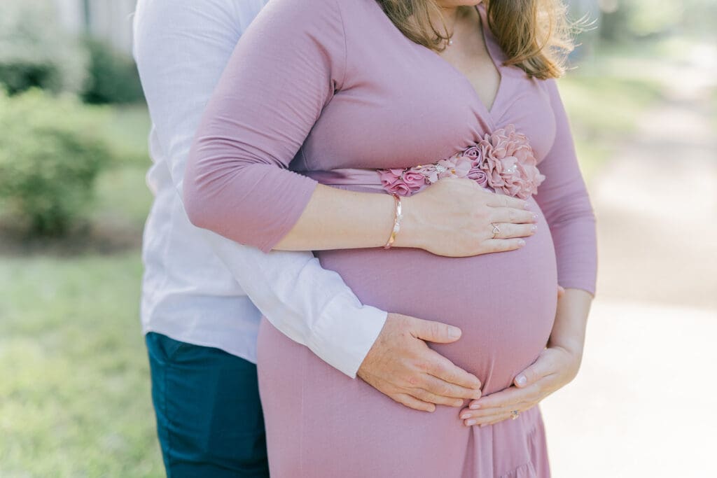 Downtown Richmond maternity photography session featuring the Huff family in their charming neighborhood.