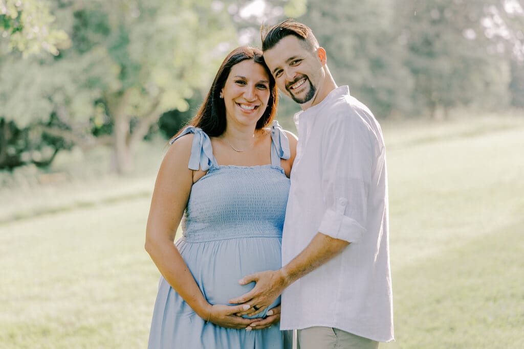 Maymont Richmond maternity photography session with the Barnes family surrounded by spring blooms and golden light.