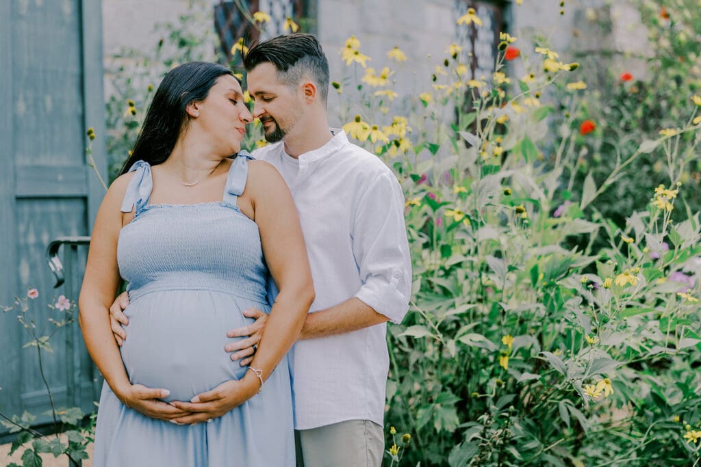 Maymont Richmond maternity photography session with the Barnes family surrounded by spring blooms and golden light.