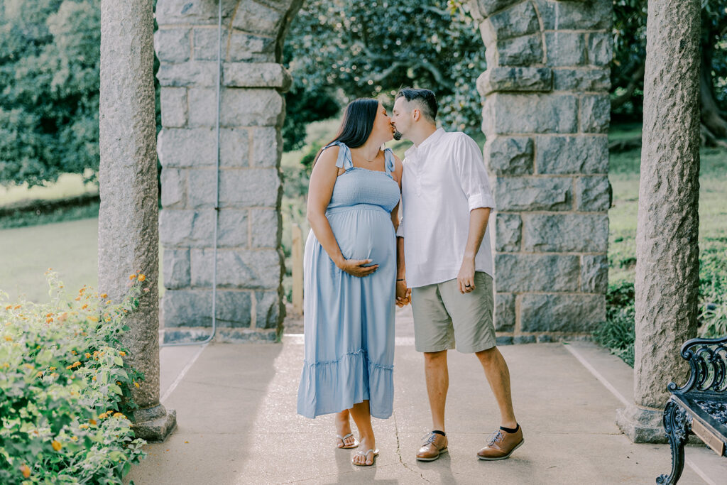 Maymont Richmond maternity photography session with the Barnes family surrounded by spring blooms and golden light.