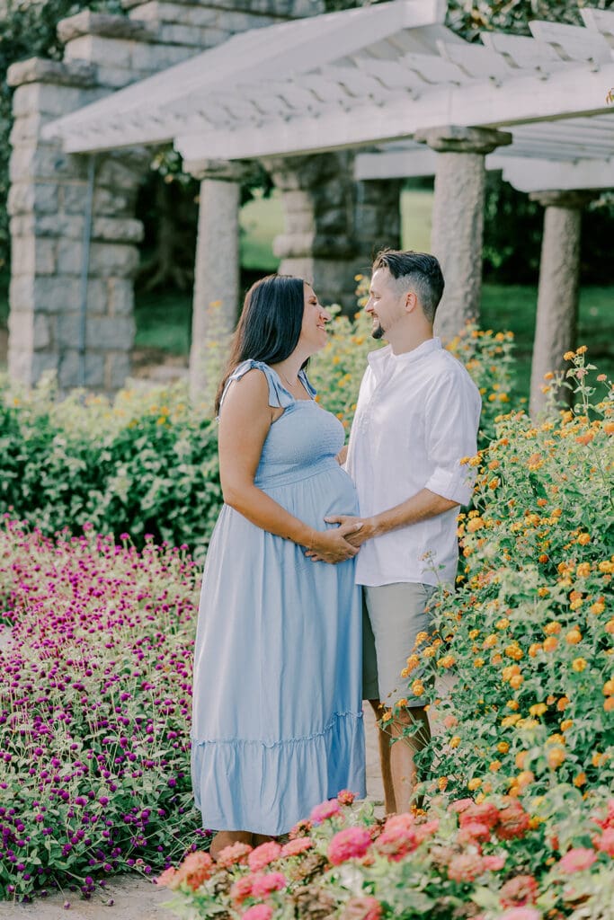 Maymont Richmond maternity photography session with the Barnes family surrounded by spring blooms and golden light.