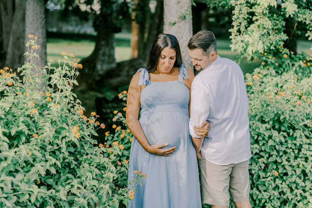 Maymont Richmond maternity photography session with the Barnes family surrounded by spring blooms and golden light.