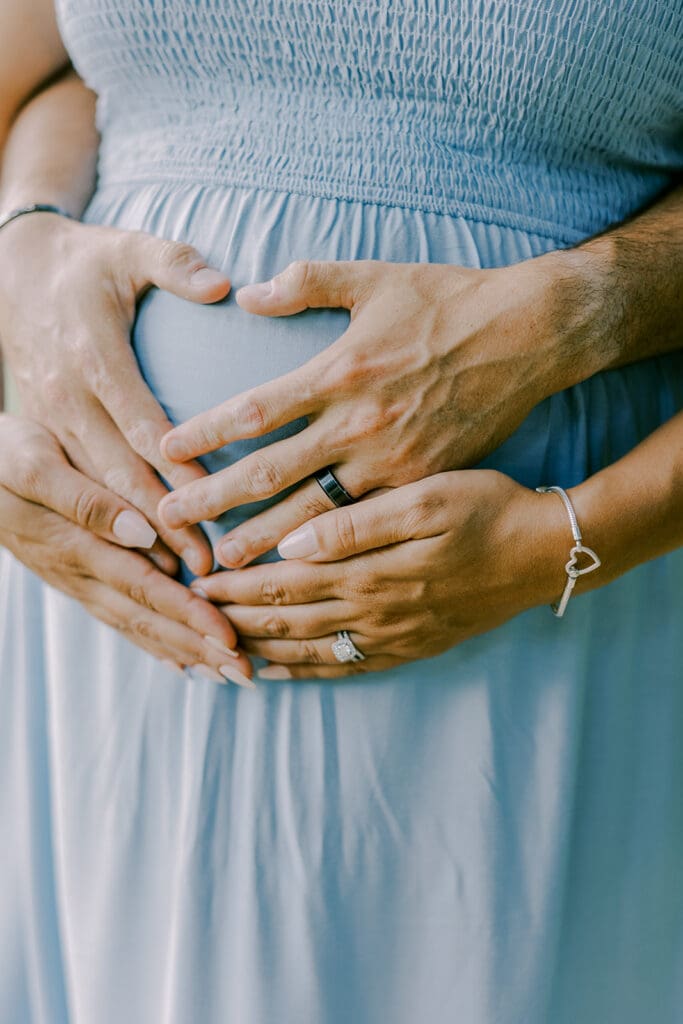 Maymont Richmond maternity photography session with the Barnes family surrounded by spring blooms and golden light.