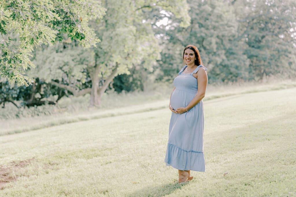 Maymont Richmond maternity photography session with the Barnes family surrounded by spring blooms and golden light.