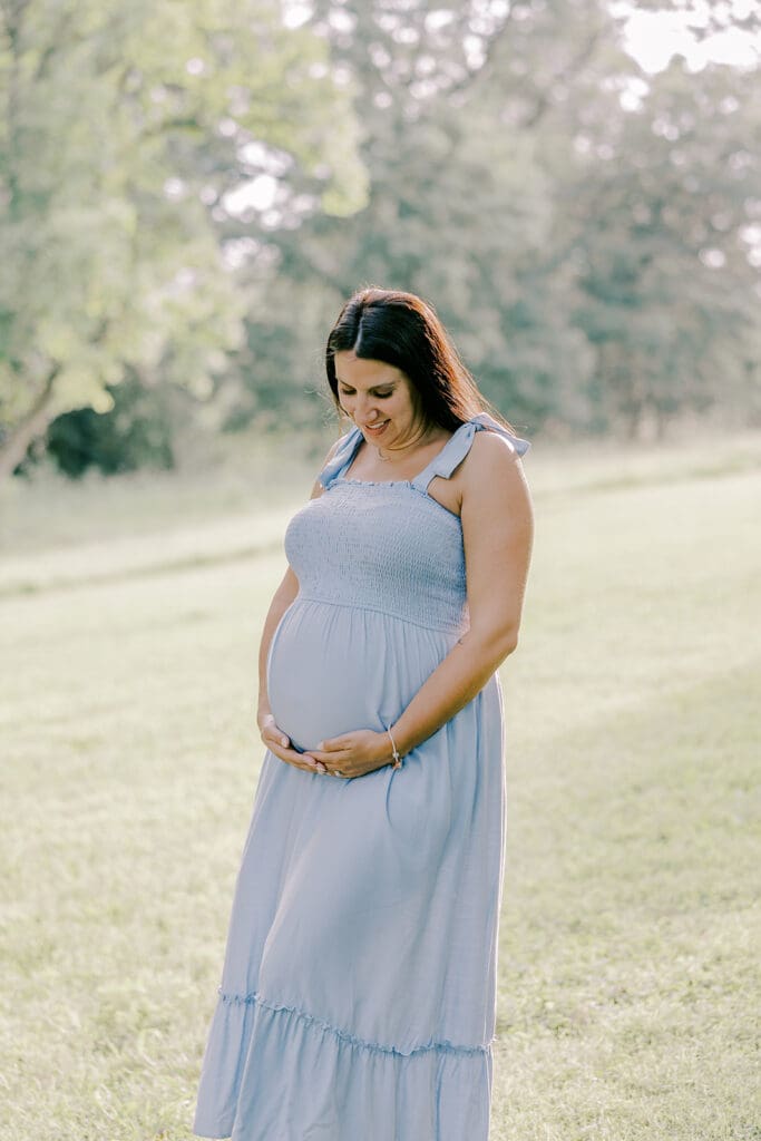 Maymont Richmond maternity photography session with the Barnes family surrounded by spring blooms and golden light.