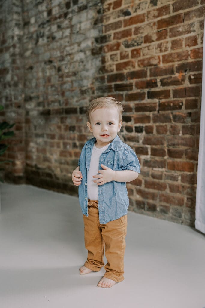 Richmond studio family photographer session with the Keeley family showing siblings and parents in a bright studio setting.