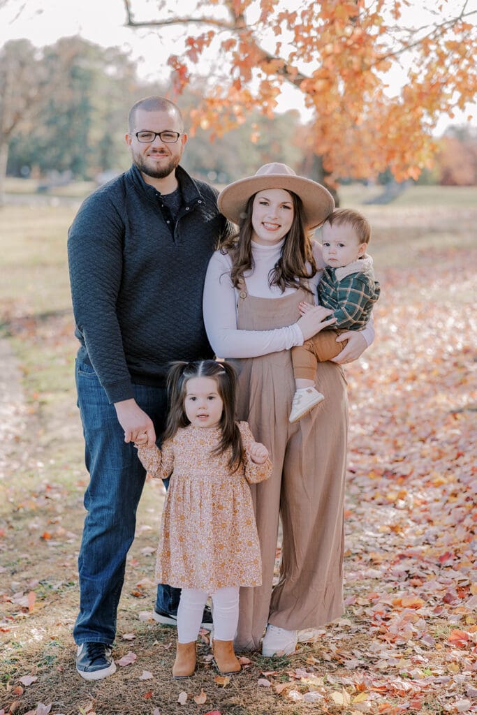 Richmond fall family photography session with the Keeley family surrounded by orange autumn leaves at Byrd Park.