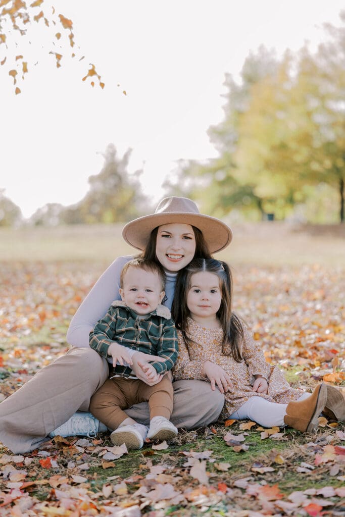 Richmond fall family photography session with the Keeley family surrounded by orange autumn leaves at Byrd Park.