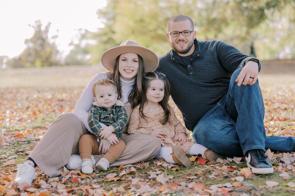 Richmond fall family photography session with the Keeley family surrounded by orange autumn leaves at Byrd Park.