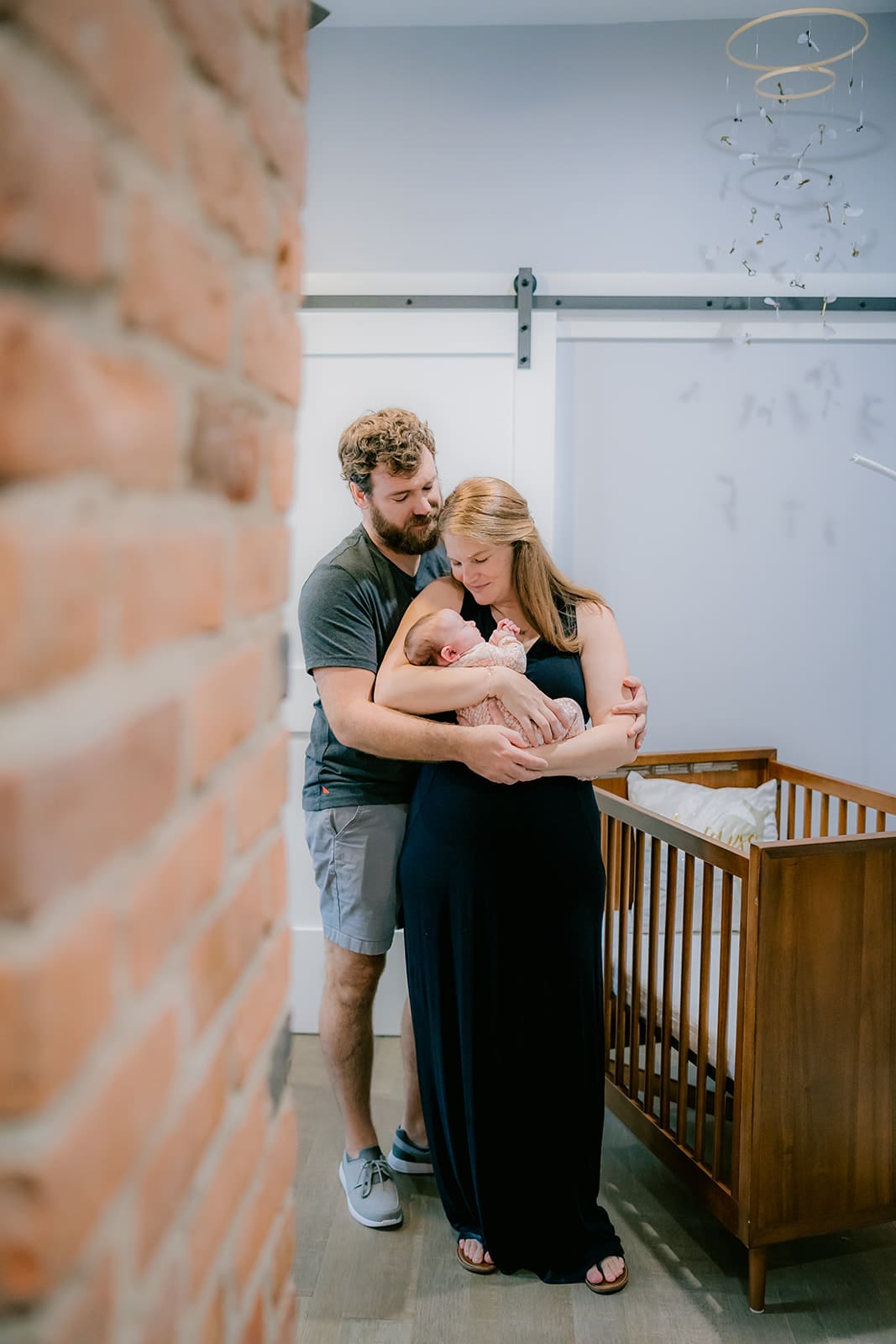 In-home Richmond newborn session with the Huff family featuring natural moments throughout their home.