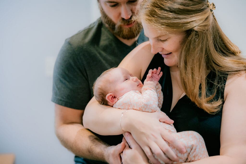 In-home Richmond newborn session with the Huff family featuring natural moments throughout their home.