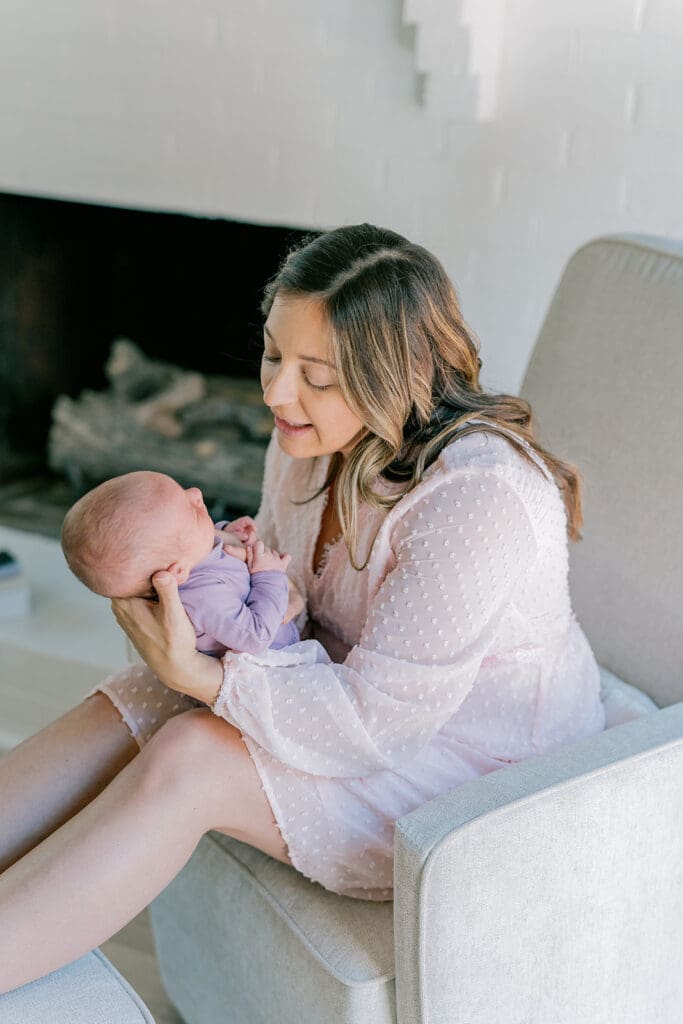 Richmond in-home lifestyle newborn session showing the Roost family with their baby in a purple-themed nursery and outdoor spring portraits.