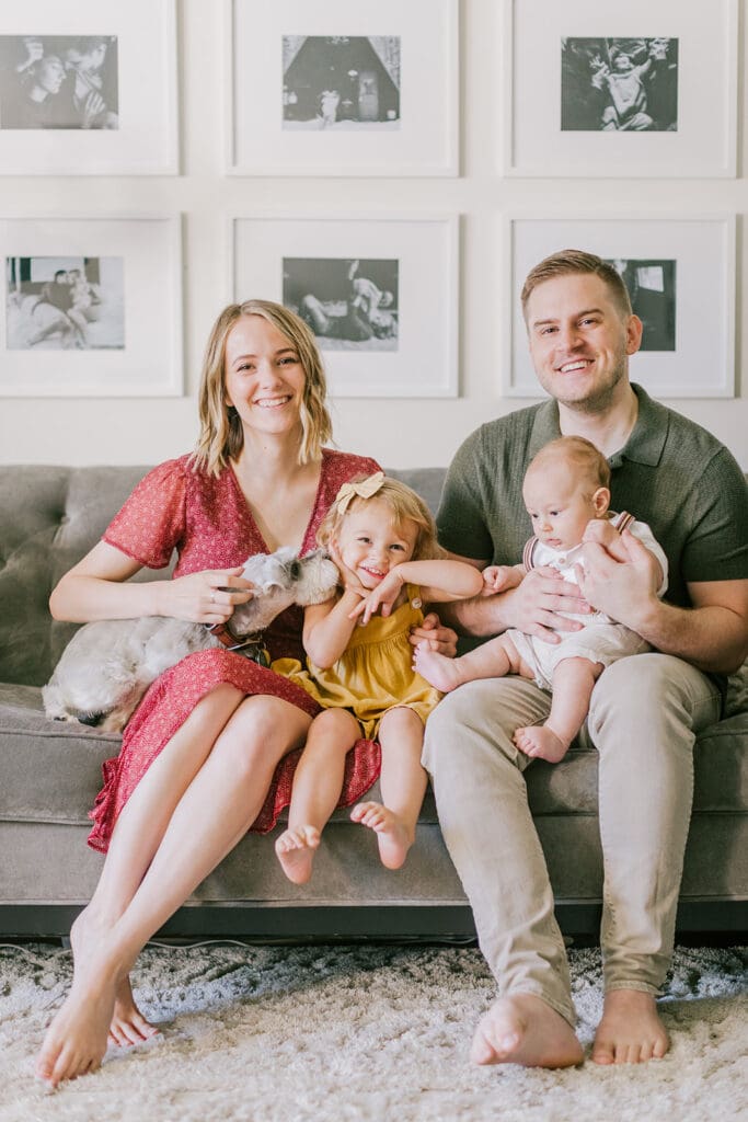 Lifestyle family photographer in Richmond documenting the Allred family reading, playing, dancing and snuggling in coordinated outfits.