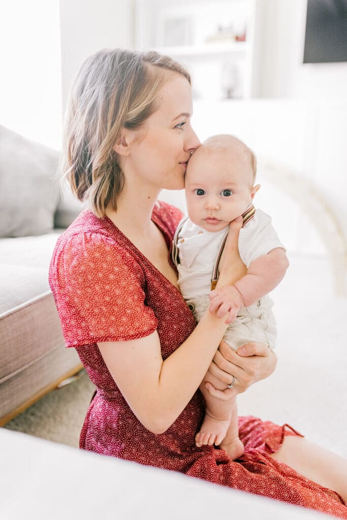 Lifestyle family photographer in Richmond documenting the Allred family reading, playing, dancing and snuggling in coordinated outfits.