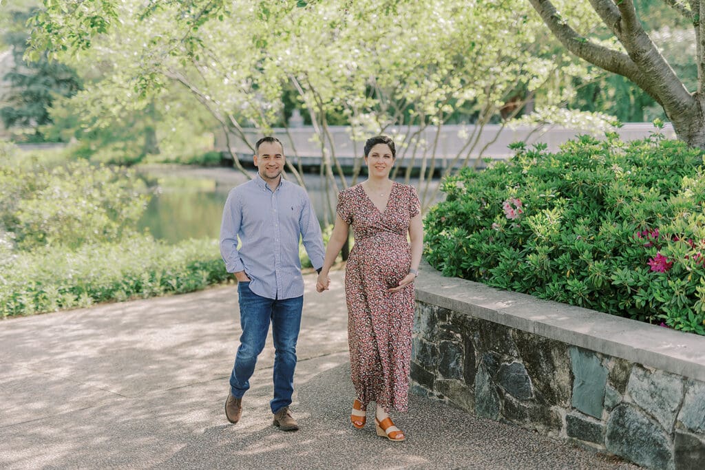 Lewis Ginter maternity photography session featuring the Mertz family surrounded by spring blooms in the botanical gardens.