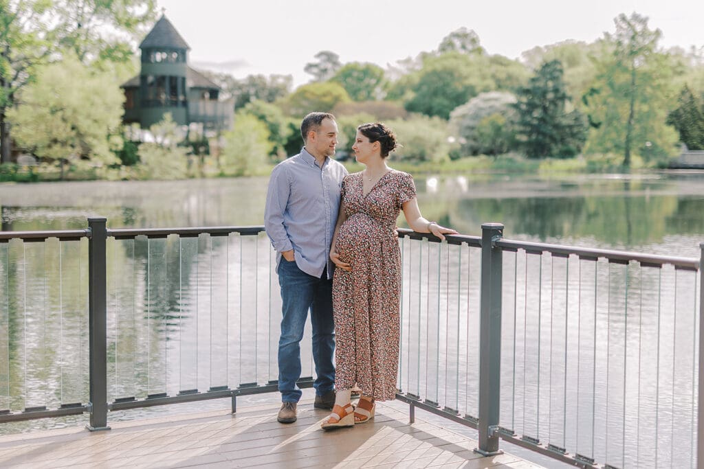 Lewis Ginter maternity photography session featuring the Mertz family surrounded by spring blooms in the botanical gardens.