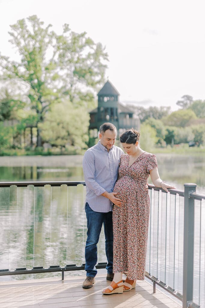 Lewis Ginter maternity photography session featuring the Mertz family surrounded by spring blooms in the botanical gardens.