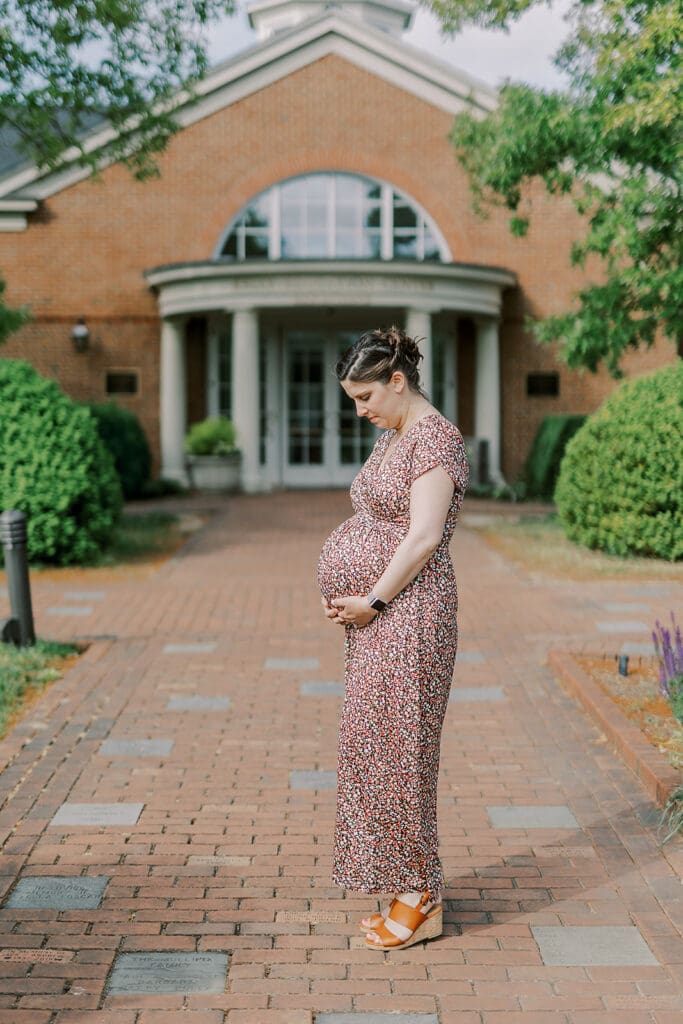 Lewis Ginter maternity photography session featuring the Mertz family surrounded by spring blooms in the botanical gardens.