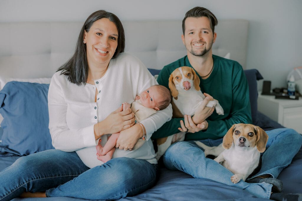 Lifestyle newborn photography in Richmond session showing the Barnes family with baby Lincoln in their home and backyard.