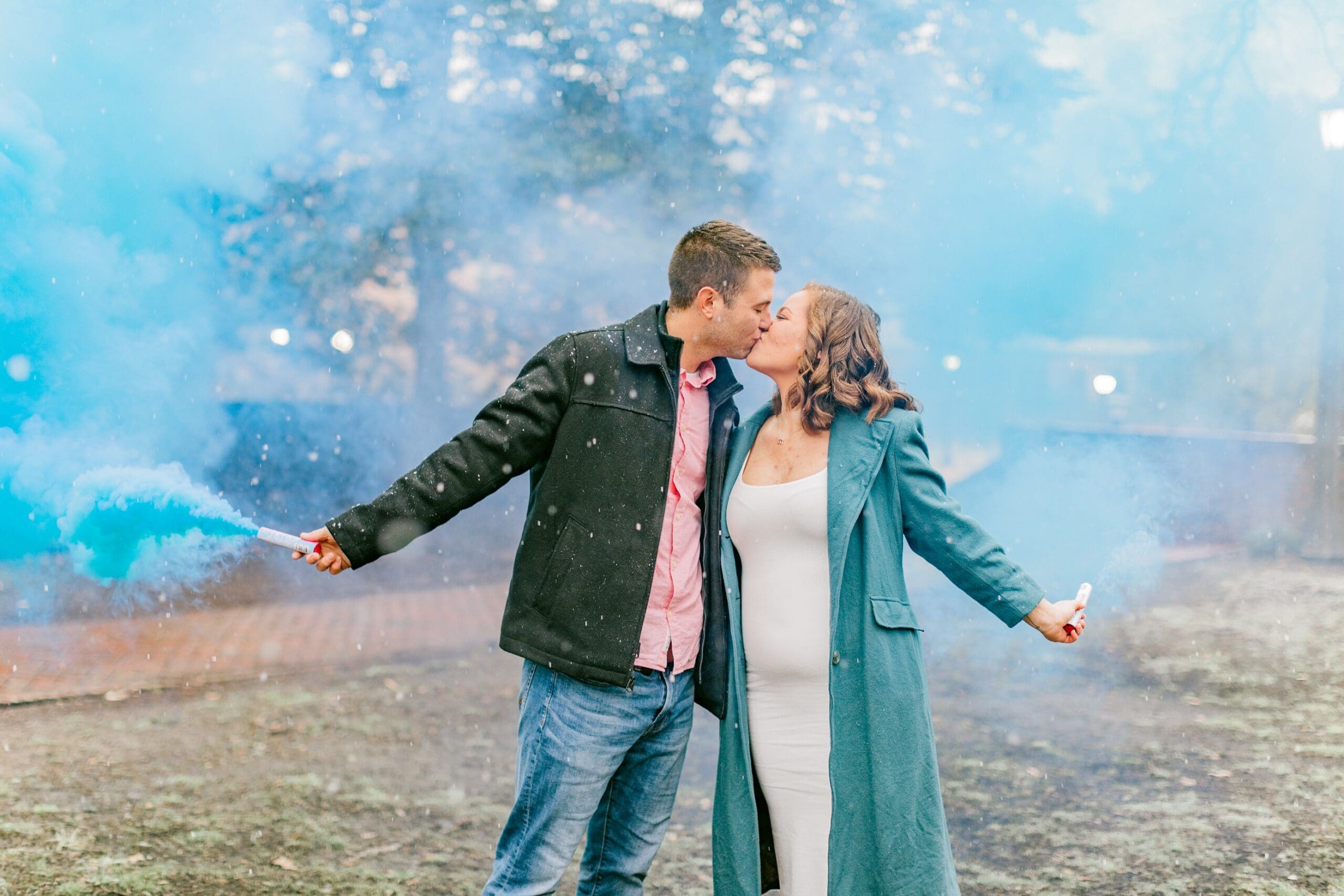 A winter portrait session to reveal the gender of a baby.