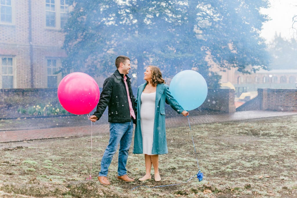 A couple waits eagerly to learn the gender of their baby during their Williamsburg gender reveal.