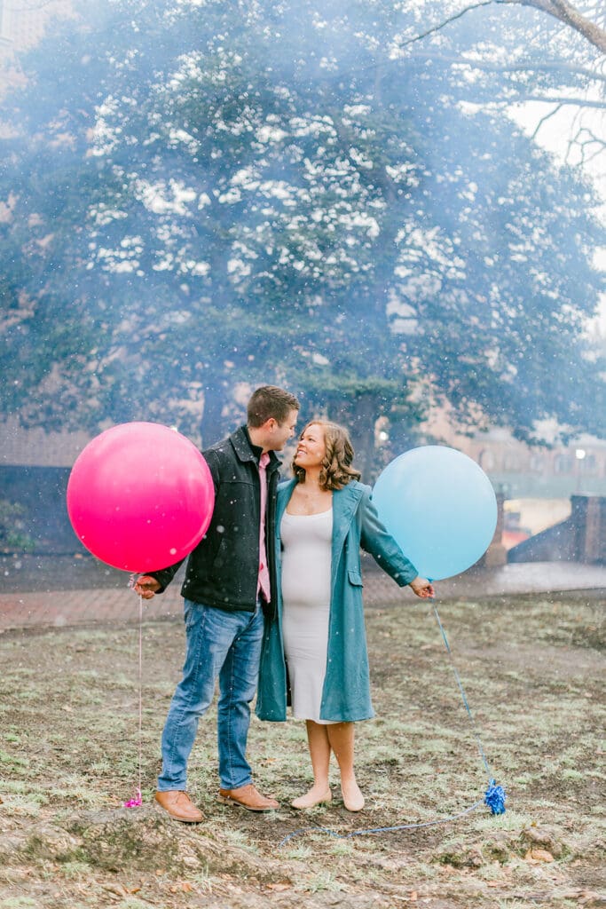 A couple waits eagerly to learn the gender of their baby during their Williamsburg gender reveal.