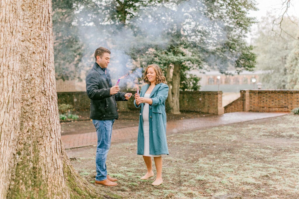 A couple waits eagerly to learn the gender of their baby during their Williamsburg gender reveal.