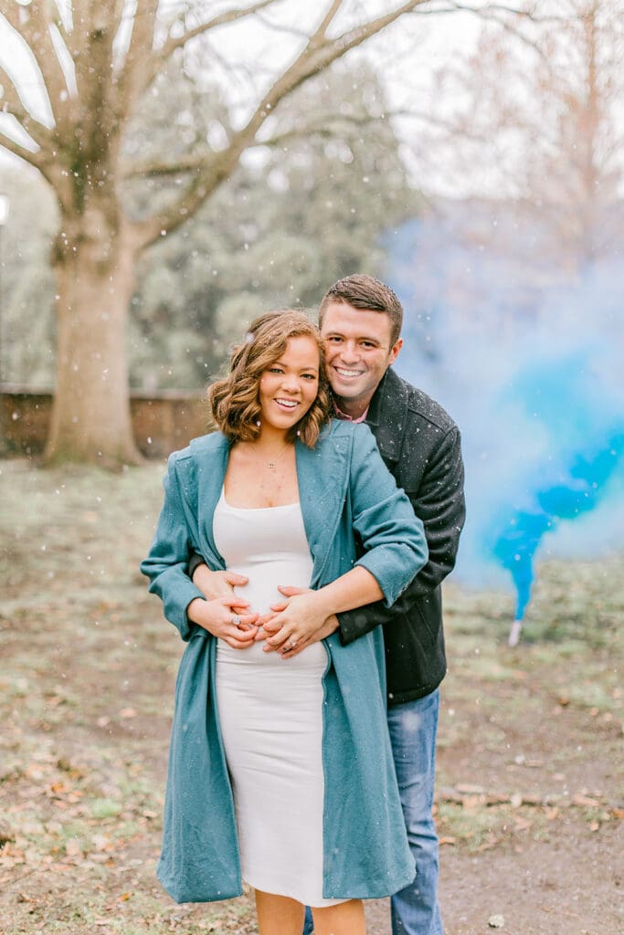 A couple waits eagerly to learn the gender of their baby during their Williamsburg gender reveal.