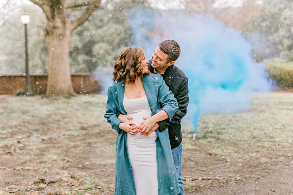 A couple waits eagerly to learn the gender of their baby during their Williamsburg gender reveal.