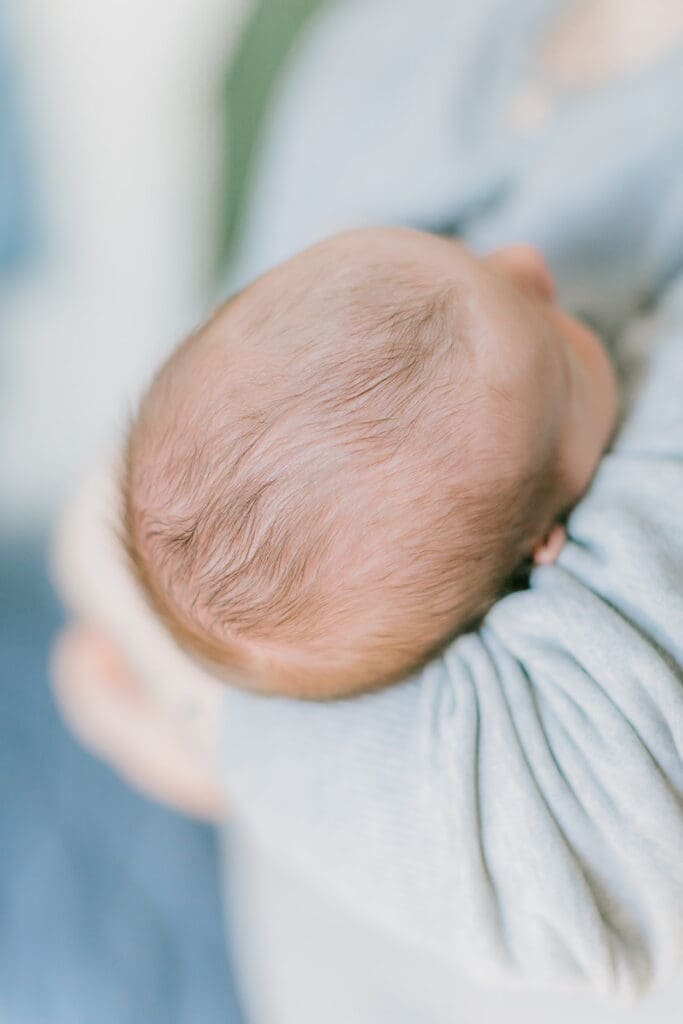 Hampton Roads newborn photography session featuring Baby Caeden in simple white setups with crate and bucket props.