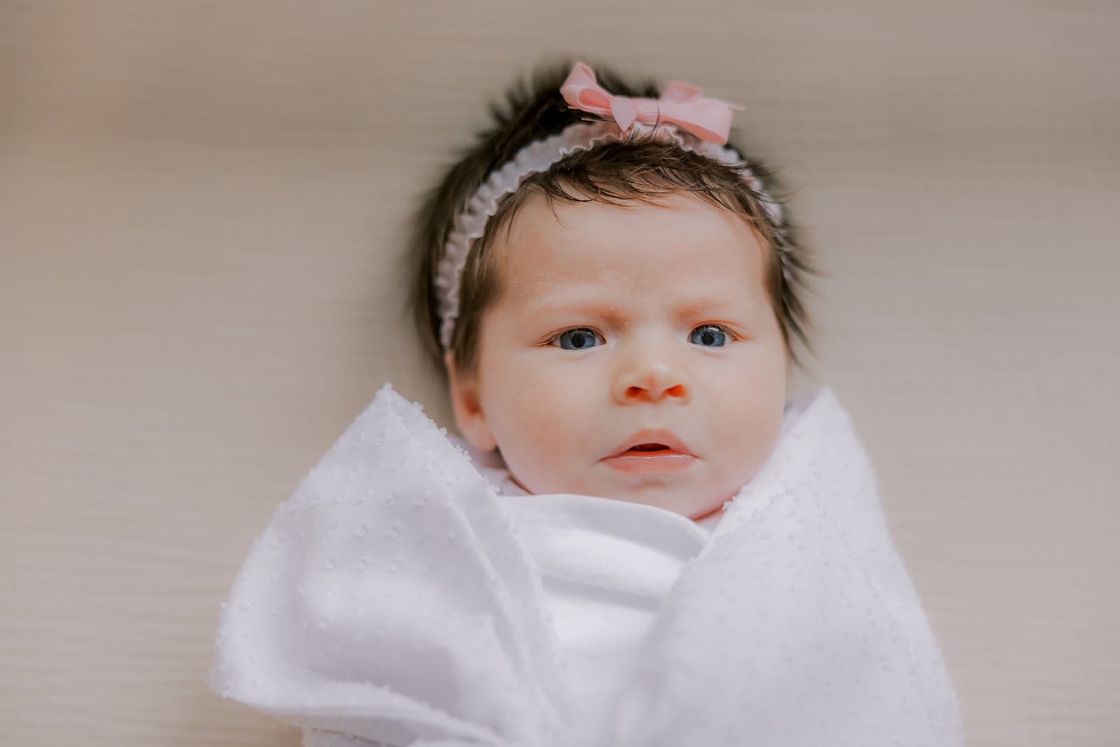 Newborn photography session in Richmond featuring the Jernigan family and their baby girl with her amazing head of hair.