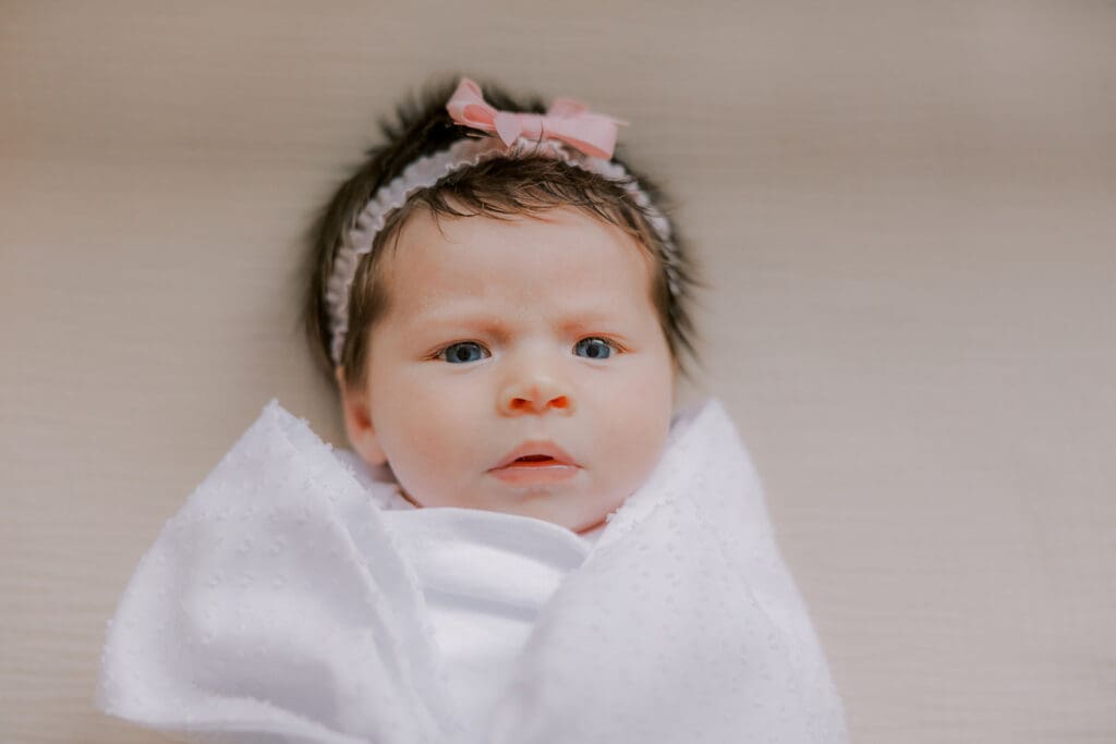 Newborn photography session in Richmond featuring the Jernigan family and their baby girl with her amazing head of hair.