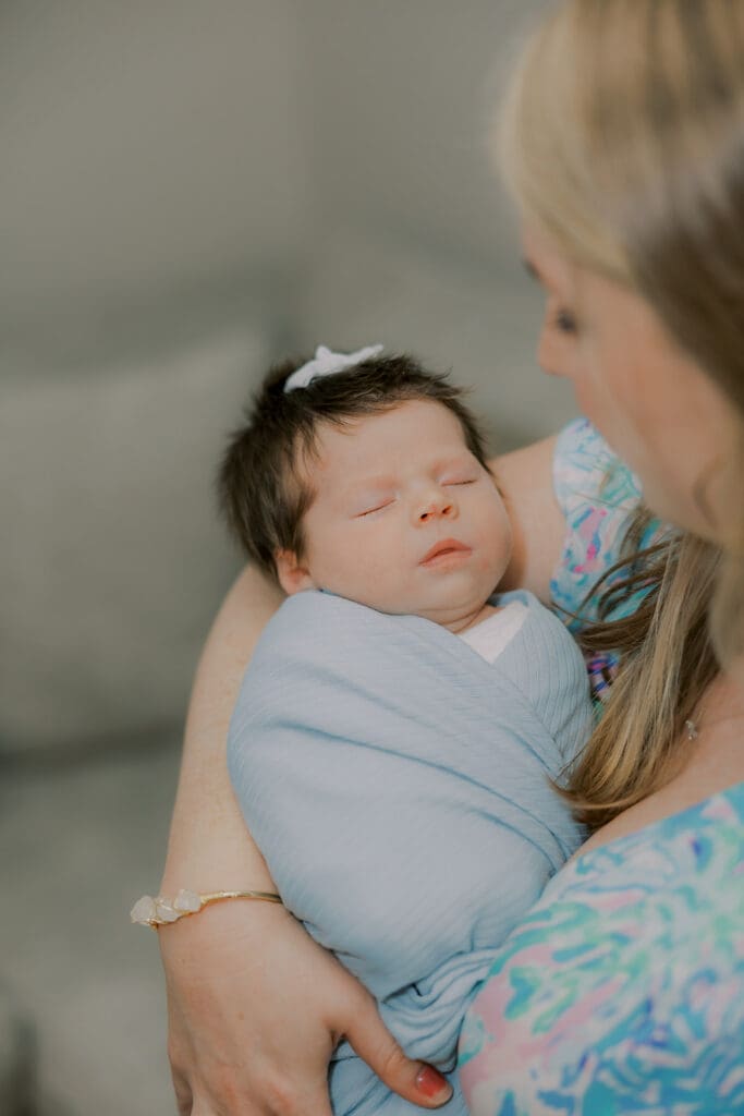 Newborn photography session in Richmond featuring the Jernigan family and their baby girl with her amazing head of hair.