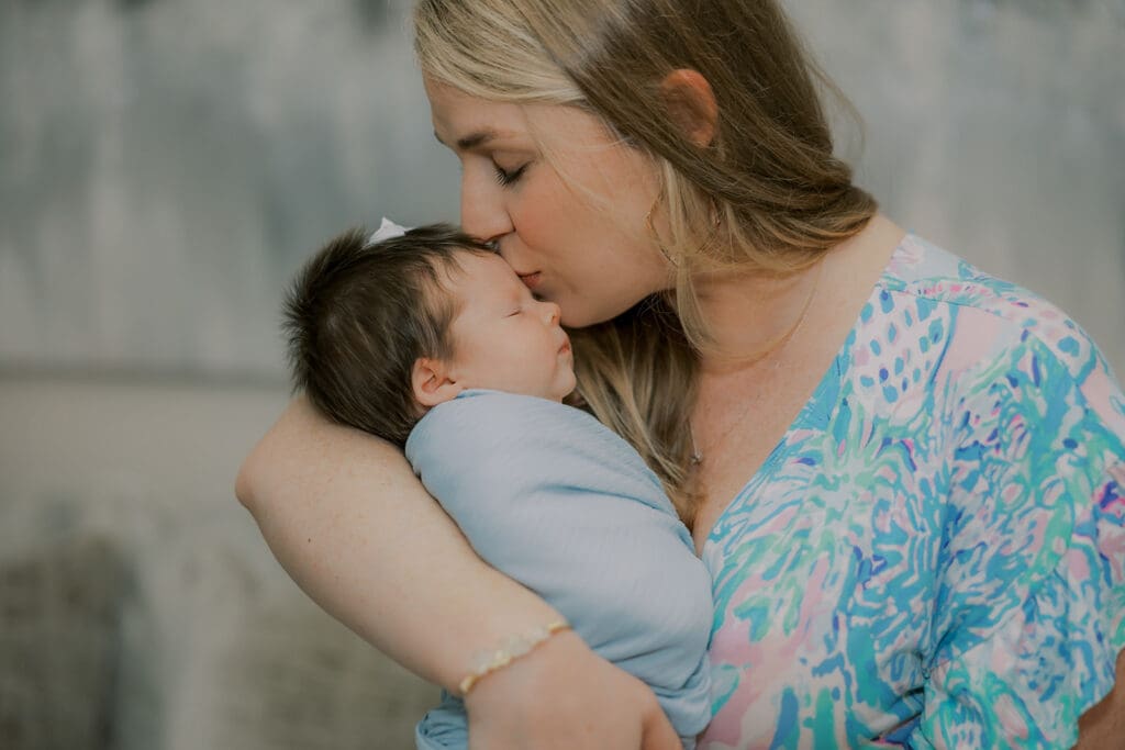 Newborn photography session in Richmond featuring the Jernigan family and their baby girl with her amazing head of hair.