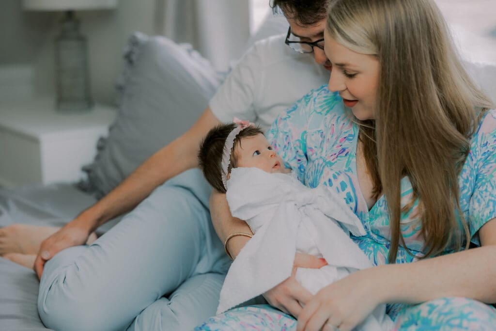 Newborn photography session in Richmond featuring the Jernigan family and their baby girl with her amazing head of hair.