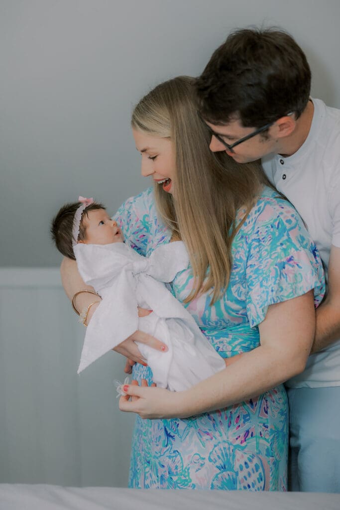 Newborn photography session in Richmond featuring the Jernigan family and their baby girl with her amazing head of hair.