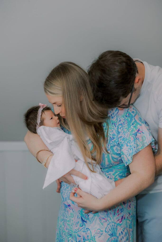 Newborn photography session in Richmond featuring the Jernigan family and their baby girl with her amazing head of hair.